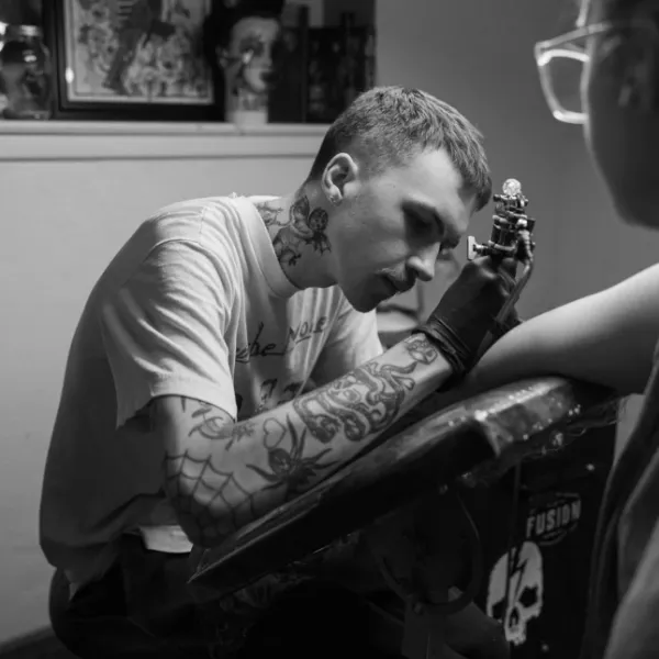 Cooper Burns, tattoo artist at 1912 Tattoo Studio