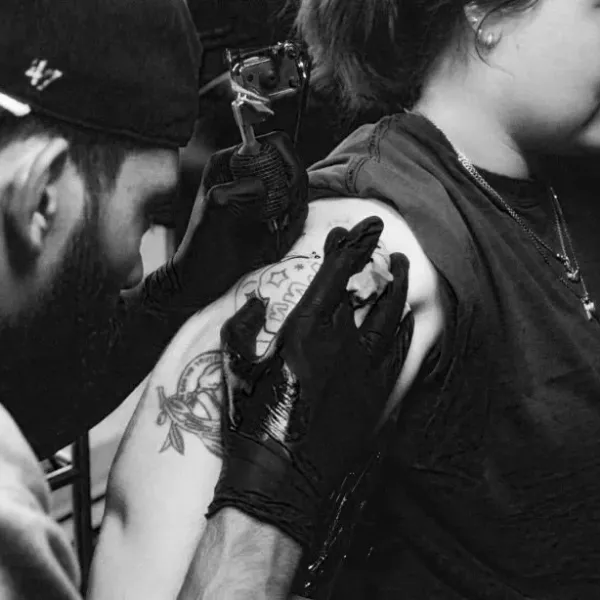 Landon Eck, tattoo artist at Dame of the West Tattoo