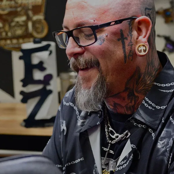 El, tattoo artist at Sun Gold Tattoo & Barber