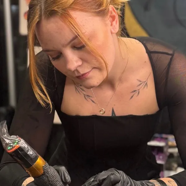 Hailey, tattoo artist at Sun Gold Tattoo & Barber